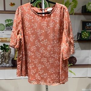 Ava & Viv Rust Floral Ruffle Sleeve Blouse 1 X. Ptp is 24.